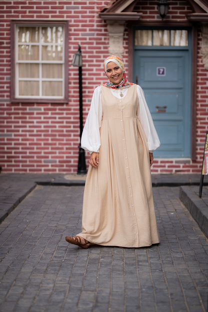 Cut Dress with attached sleeves